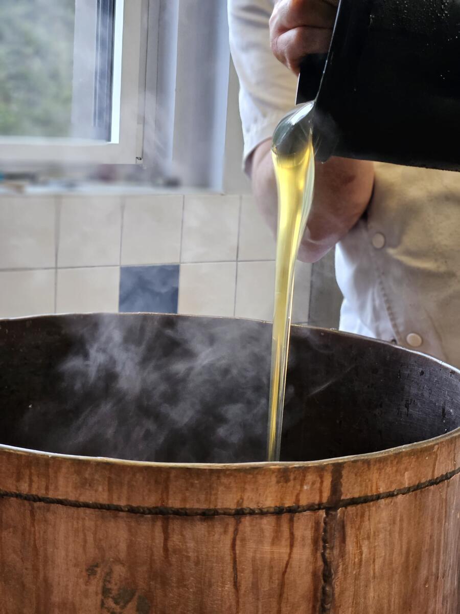 Hot syrup poured into the copper kettle